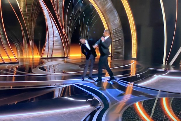 Will Smith slaps Chris Rock at the 2022 Oscars