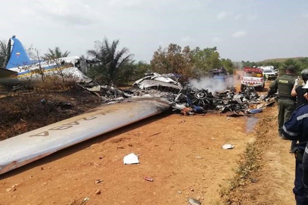 Emergency services are ion scene collecting evidence from the crash site to determine the cause of a fatal plane crash in Colombia.