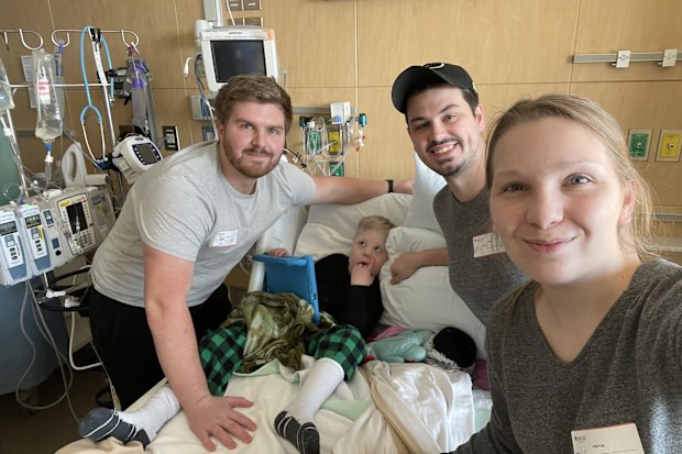 Gabryel with his family while in hospital. 