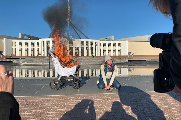 A climate protest has ramped up outside Parliament House following a climate change report.