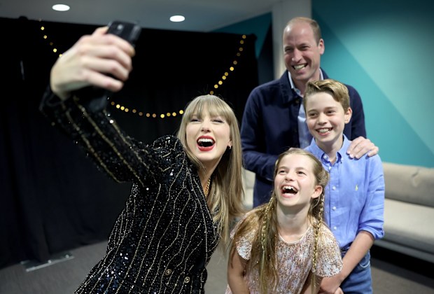 Taylor Swift takes a selfie with Prince William, Prince George and Princess Charlotte at Wembley Stadium, London