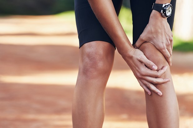Cropped shot of a runner holding onto her injured kneehttp://195.154.178.81/DATA/i_collage/pi/shoots/805758.jpg
