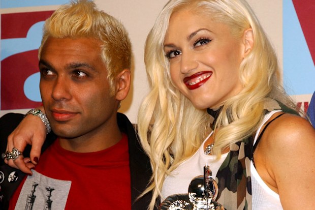 NEW YORK - AUGUST 29: Lead singer Gwen Stefani of No Doubt and bassist Tony Kanal pose in the media room at the 2002 MTV Video Music Awards at Radio City Music all August 29,2002 in New York City (Photo by Mark Mainz/Getty Images)