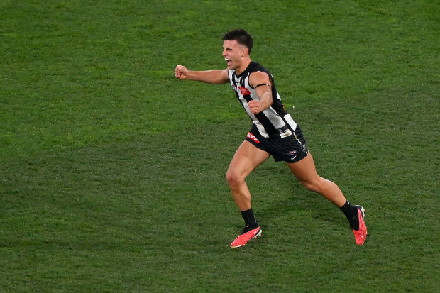 MELBOURNE, AUSTRALIA - SEPTEMBER 22: Nick Daicos of the Magpies celebrates on the final siren during the 2023 AFL First Preliminary Final match between the Collingwood Magpies and the GWS GIANTS at Melbourne Cricket Ground on September 22, 2023 in Melbourne, Australia. (Photo by Morgan Hancock/AFL Photos via Getty Images)
