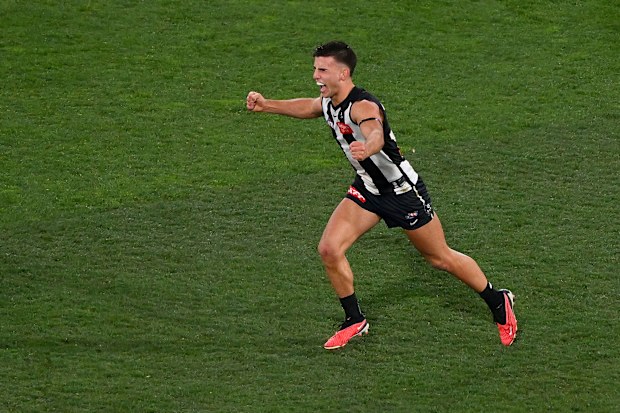 MELBOURNE, AUSTRALIA - SEPTEMBER 22: Nick Daicos of the Magpies celebrates on the final siren during the 2023 AFL First Preliminary Final match between the Collingwood Magpies and the GWS GIANTS at Melbourne Cricket Ground on September 22, 2023 in Melbourne, Australia. (Photo by Morgan Hancock/AFL Photos via Getty Images)