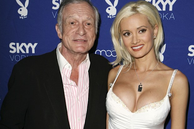 Hugh Hefner and Holly Madison attend the Playboy and Skyy Vodka Party on July 18, 2006 in Los Angeles, California.