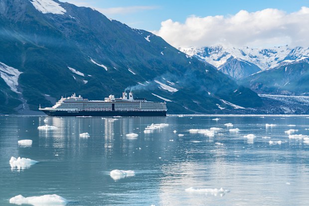 Glacier Bay, AK - September 5, 2022: Holland America cruise ship Nieuw Amsterdam sailing through the icy waters of  Glacier Bay, Alaska