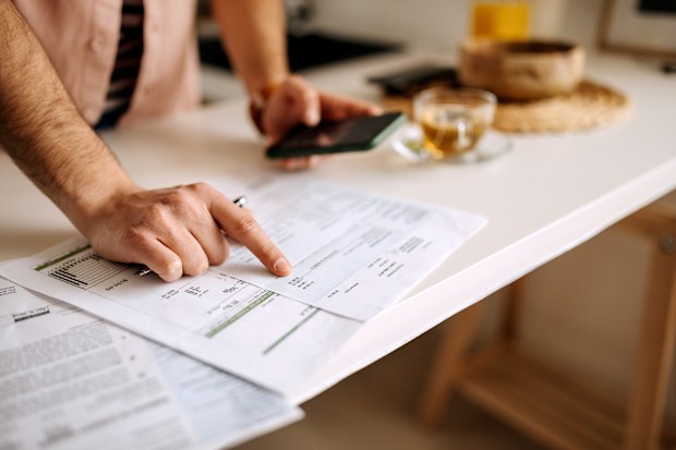 Person paying power bill
