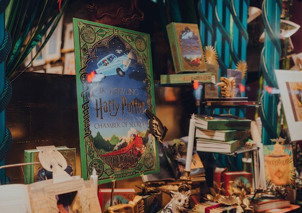 Harry potter books in the window of MinaLima, the design studio behind the graphic props of the Harry Potter and Fantastic Beasts films, in Covent Garden, London.