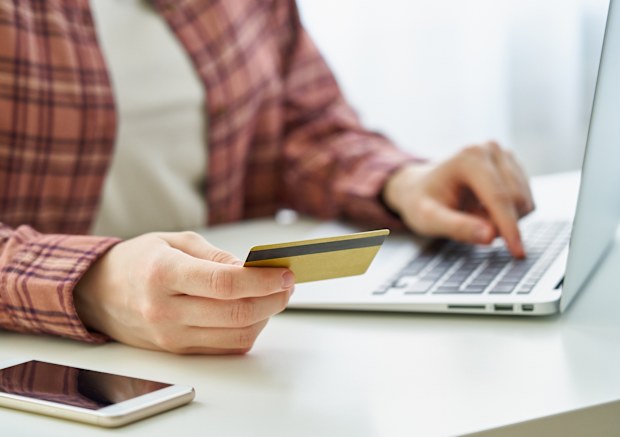 Concept of millennial data privacy and keeping personal information safe online. Booking and purchasing in digitally-connected world. Phishing and scam on Internet. Cybersecurity awareness among youn people