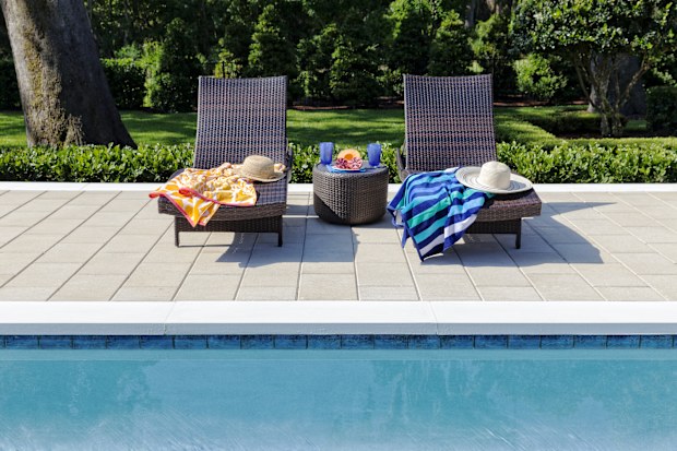 Tropical refreshments add to the leisure time at the the pool. sunbeds