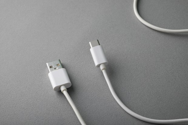 USB Type-C charging cable on gray background
