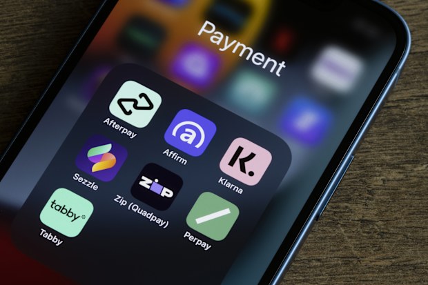 Portland, OR, USA - Oct 20, 2021: Assorted payment apps offering Buy Now Pay Later services are seen on an iPhone, including Afterpay, Affirm, Klarna, Sezzle, Zip (Quadpay), Perpay, and Tabby.