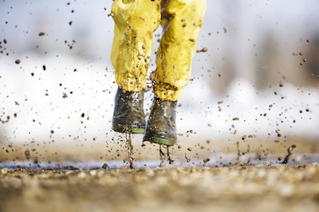 Child Playing in the puddles