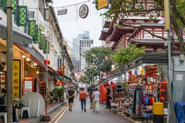 Scenic view of the Chinatown Singapore, people can seen exploring and shopping around it.