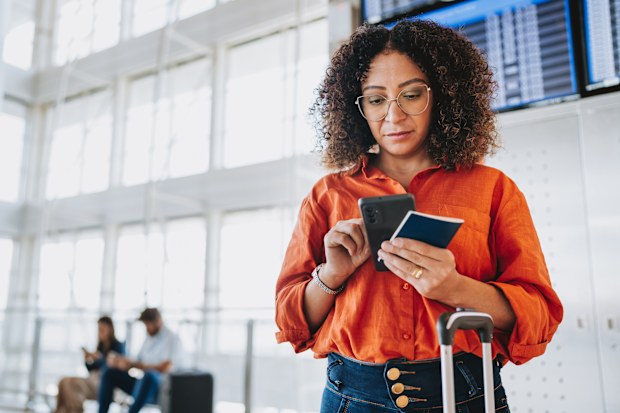 Woman, airport, phone, passport