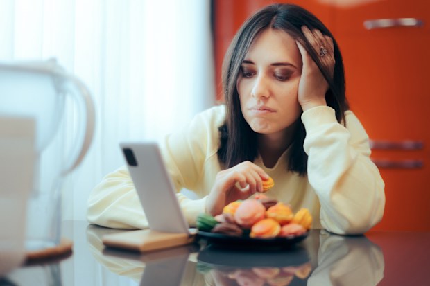 Unhappy person struggling with mental health and eating disorder health issues