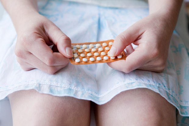 woman with the pill contraception