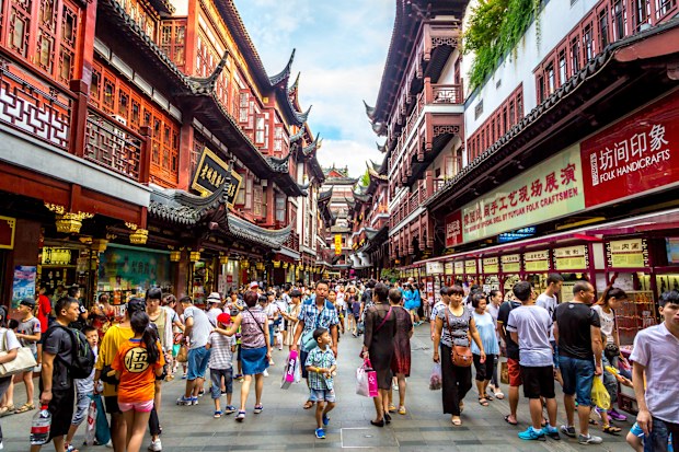 Shanghai, China Local and tourists enjoying a hot summer day in downtown Shanghai in China, Asia.