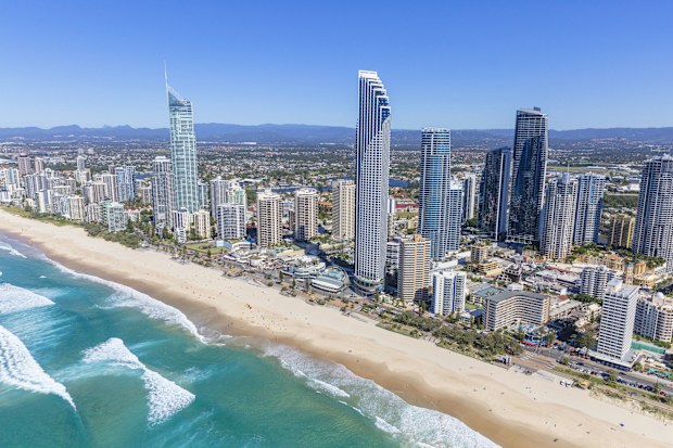Wide angle aerial view of Surfers Paradise during summer on the Gold Coast, Queensland.