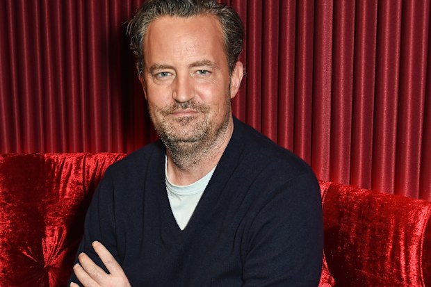 Matthew Perry poses at a photocall for "The End Of Longing", a new play which he wrote and stars in at The Playhouse Theatre, on February 8, 2016 in London, England.  