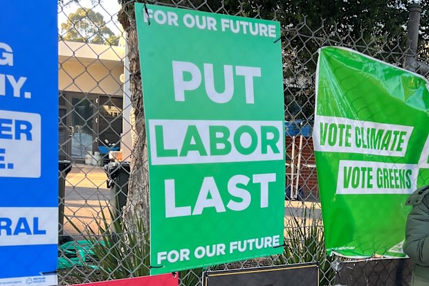 Labor is seeking an injunction over "Put Labor Last" signs appearing in Higgins, designed to look like they were placed by the Greens but allegedly from the Liberal Party.