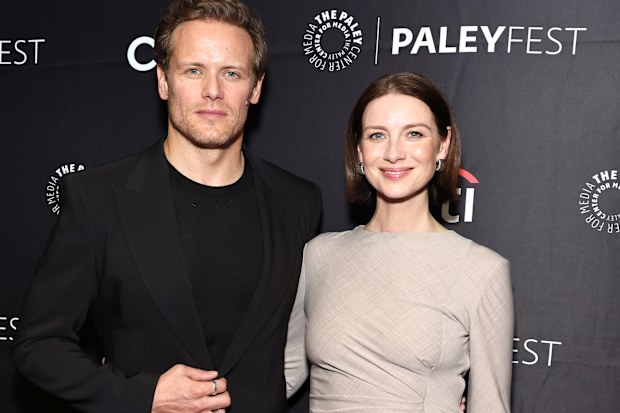 NEW YORK, NEW YORK - OCTOBER 16: (L-R) Sam Heughan and Caitriona Balfe attend Outlander: 10th Anniversary Celebration At PaleyFest on October 16, 2024 in New York City. (Photo by Jamie McCarthy/Getty Images for STARZ)
