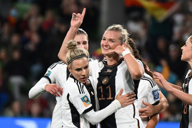 dpatop - 24 July 2023, Australia, Melbourne: Soccer, Women: World Cup, Germany - Morocco, Preliminary Round, Group H, Matchday 1, Melbourne Rectangular Stadium: Germany's Alexandra Popp (center) celebrates the 2:0 with her teammates. Photo: Sebastian Christoph Gollnow/dpa (Photo by Sebastian Christoph Gollnow/picture alliance via Getty Images)