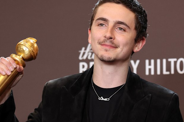 BEVERLY HILLS, CALIFORNIA - JANUARY 11: (FOR EDITORIAL USE ONLY) Timothée Chalamet, winner of the Best Performance by a Male Actor in a Motion Picture  Musical or Comedy Award for "Marty Supreme" poses in the press room during the 83rd Annual Golden Globe Awards at The Beverly Hilton on January 11, 2026 in Beverly Hills, California. (Photo by Amy Sussman/Getty Images)
