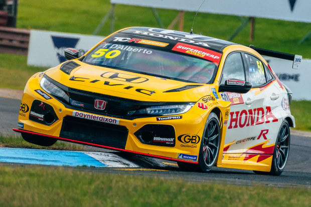 The Wall Racing Honda Civic Type R climbs the kerb at Sandown. 