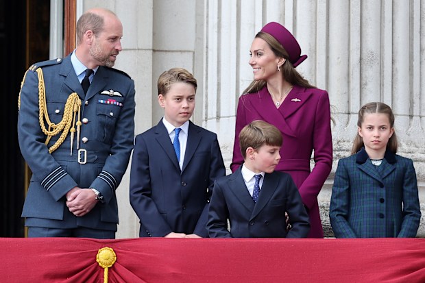 Prince George of Wales, Prince Louis of Wales, Catherine, Princess of Wales and Princess Charlotte of Wales on the balcony of Buckingham Palace during the military procession to mark the 80th anniversary of VE Day on May 05, 2025 in London, England.