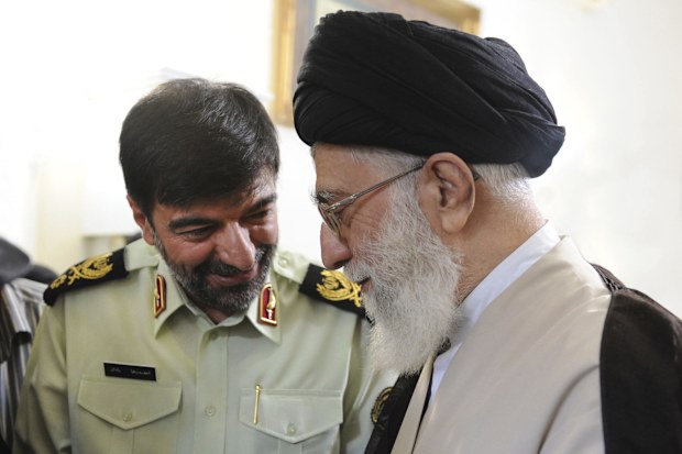 In this undated photo released on Saturday, Jan. 7, 2023, by the official website of the office of the Iranian supreme leader, Supreme Leader Ayatollah Ali Khamenei, right, speaks with Gen. Ahmad Reza Radan, Iran. 