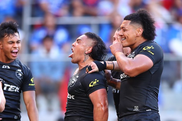 Erin Clark celebrates scoring his go-ahead try for New Zealand.