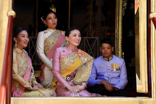 The king's daughters Princess Bajrakitiyabha and Princess Sirivannavari Nariratana, Queen Suthida and the king's son Prince Dipangkorn Rasmijoti (L to R), during the monarch's coronation ceremony at the Grand Palace in Bangkok, Thailand, yesterday. 