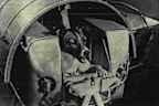 Laika In Sputnik Cabin -- "Laika", the dog now believed to be dead and encircling the Earth in the second Soviet satellite, seen in its air-conditions cabin before being put in the Sputnik. Sputnik II has now been silent for almost four days. In Moscow a Soviet Communist Party newspaper has said that the dog had made a Great contribution towards mastering inter-planetary flight. November 13, 1957. (Photo by United Press Photo).