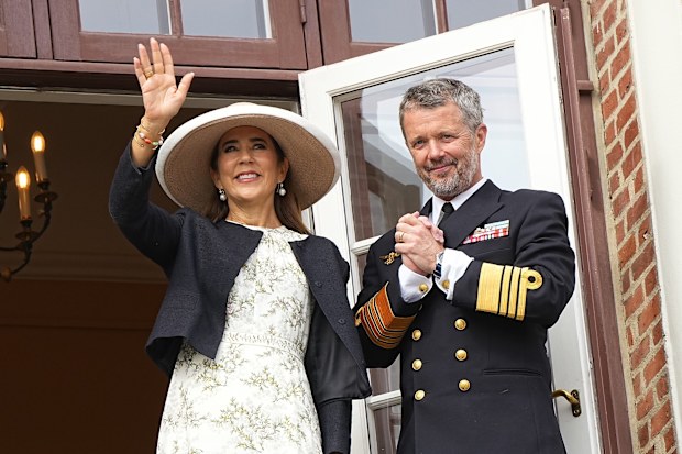 Danish King Frederik and Queen Mary wave to the people during a summer tour to Thisted Municipality in Denmark, Tuesday, Aug. 26, 2025. (Bo Amstrup/Ritzau Scanpix via AP)
