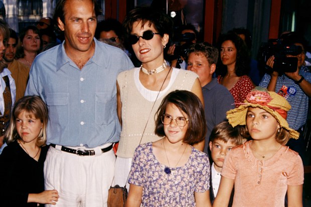 Kevin Costner and former wife Cindy Silva with children Annie, Lily and Joe arrive at the Wyatt Earp premiere on June 18, 1994.