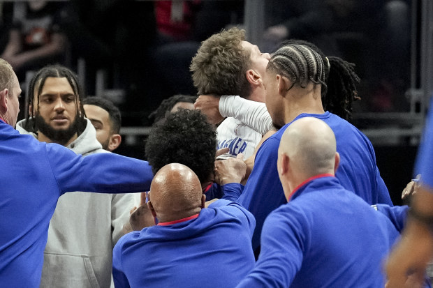 DETROIT, MICHIGAN - DECEMBER 28: Killian Hayes #7 of the Detroit Pistons punches Moritz Wagner #21 of the Orlando Magic in the back of the head during the second quarter at Little Caesars Arena on December 28, 2022 in Detroit, Michigan. NOTE TO USER: User expressly acknowledges and agrees that, by downloading and or using this photograph, User is consenting to the terms and conditions of the Getty Images License Agreement. (Photo by Nic Antaya/Getty Images)