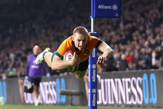 Max Jorgensen of Australia celebrates as he scores his winning try.