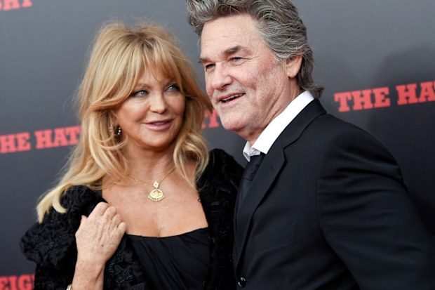 FILE - In this Dec. 14, 2015, file photo, actors Goldie Hawn and Kurt Russell attend the premiere of "The Hateful Eight" at the Ziegfeld Theatre in New York. Hawn tells British chat show "Loose Women" that she "would have been long divorced" is she had gotten married. (Photo by Evan Agostini/Invision/AP, File)
