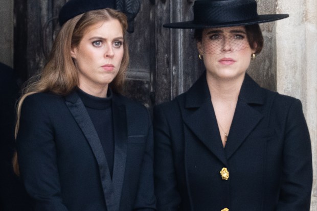 LONDON, ENGLAND - SEPTEMBER 19:  Princess Beatrice of York and Princess Eugenie of York during the State Funeral of Queen Elizabeth II at Westminster Abbey on September 19, 2022 in London, England.  Elizabeth Alexandra Mary Windsor was born in Bruton Street, Mayfair, London on 21 April 1926. She married Prince Philip in 1947 and ascended the throne of the United Kingdom and Commonwealth on 6 February 1952 after the death of her Father, King George VI. Queen Elizabeth II died at Balmoral Castle i