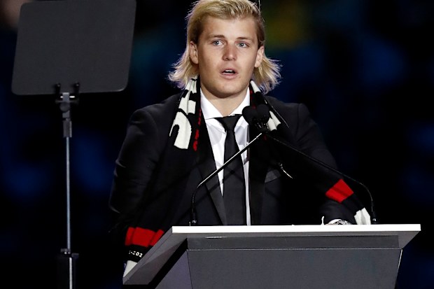 Jackson Warne speaks on stage during the state memorial service for Shane Warne at the Melbourne Cricket Ground on March 30, 2022 in Melbourne, Australia. 