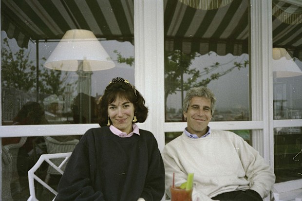 This undated trial evidence image obtained December 8, 2021, from the US District Court for the Southern District of New York shows British socialite Ghislaine Maxwell and US financier Jeffrey Epstein.