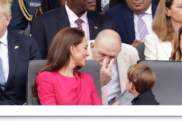 Catherine, Duchess of Cambridge, Mike Tindall and Prince Louis of Cambridge speak ahead the Platinum Pageant on June 05, 2022 in London, England.