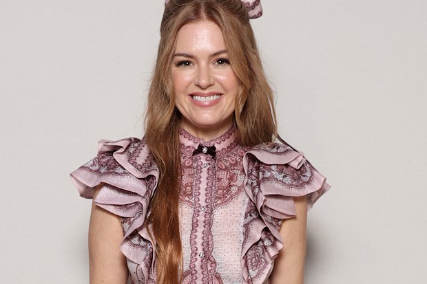 PARIS, FRANCE - SEPTEMBER 30: (EDITORIAL USE ONLY - For Non-Editorial use please seek approval from Fashion House) Isla Fisher attends the Zimmermann Paris Womenswear Spring-Summer 2025 show as part of Paris Fashion Week on September 30, 2024 in Paris, France. (Photo by Pascal Le Segretain/Getty Images)