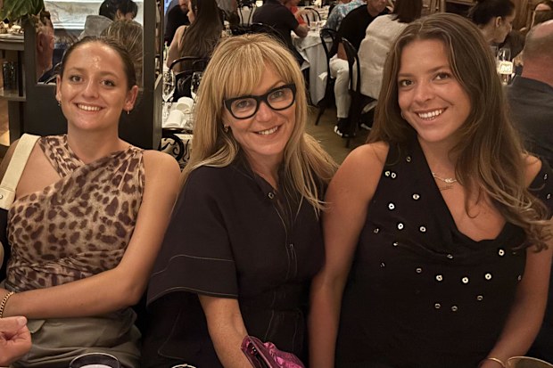 Suzie Betts (centre) with her two daughters.