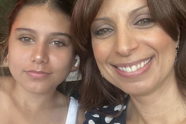 Jo Abi with her daughter Kitty, 13.