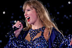 MELBOURNE, AUSTRALIA - FEBRUARY 16: EDITORIAL USE ONLY. NO BOOK COVERS  performs on stage at Melbourne Cricket Ground on February 16, 2024 in Melbourne, Australia. (Photo by Graham Denholm/TAS24/Getty Images for TAS Rights Management)