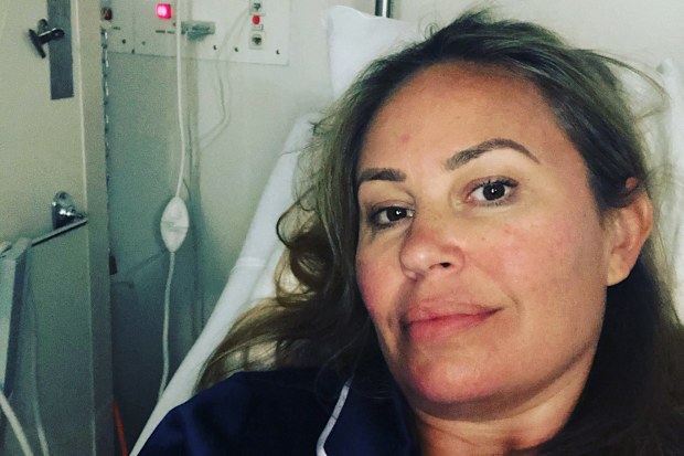 Georgette Hewitt in hospital after being diagnosed with breast cancer.