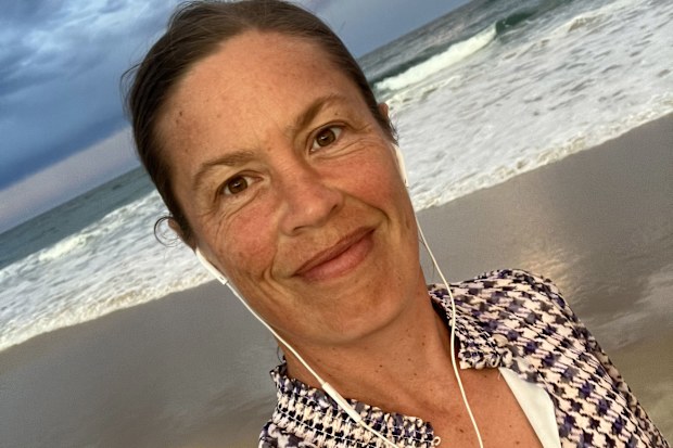 Robyn Smith is very satisfied with her flat chest.